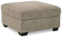 Signature Design by Ashley® 1530511 Creswell - Stone - Ottoman With Storage