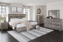 Ashley Furniture B2587/31/36/44/72/97/92(2) Ashley Furniture B2587/31/36/44/72/97/92(2) Ralinksi - 7 Pc. - Dresser, Mirror, Chest, King Panel Bed, 2 Nightstands - Gray