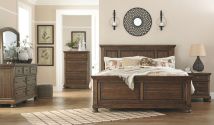 Signature Design by Ashley® B719/31/36/46/58/56/97/92 Flynnter - Medium Brown - 7 Pc. - Dresser, Mirror, Chest, King Panel Bed, Nightstand