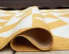 Ashley Furniture R900062 Ashley Furniture R900062 Thomley - 5' x 7' Rug - Ivory / Yellow