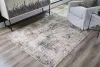 Ashley Furniture R406702 Elaning - 5' x 7' Rug - Black / Gray / Cream