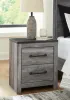 Ashley Furniture B1290-92 Bronyan - Two Drawer Night Stand - Dark Gray