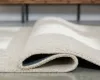 Ashley Furniture R407662 Ashley Furniture R407662 Wolbert - 5' x 7' Rug - Tan / Ivory