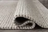 Ashley Furniture R405101 Jossick - 8' x 10' Rug - Cream / Taupe