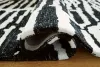 Ashley Furniture R406760 Ashley Furniture R406760 Bramshaw - 10' x 14' Rug - Black / Ivory