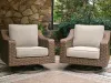 Ashley Furniture PCP790-821 Laguna Heights - Swivel Lounge With Cushion - Beige