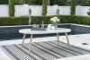 Ashley Furniture P798-625 Seton Creek - Oval Dining Table With Umb Opt - White