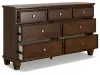 Ashley Furniture B685/31/36/57/54/97/92(2) Ashley Furniture B685/31/36/57/54/97/92(2) Danabrin - 7 Pc. - Dresser, Mirror, Queen Panel Bed, 2 Nightstands - Brown