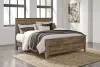 Ashley Furniture B446-58 Trinell - King/Cal King Panel Headboard - Brown