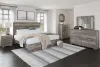 Ashley Furniture B2587/31/36/44/72/97/92(2) Ashley Furniture B2587/31/36/44/72/97/92(2) Ralinksi - 7 Pc. - Dresser, Mirror, Chest, King Panel Bed, 2 Nightstands - Gray