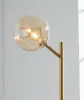Ashley Furniture L206021 Abanson - Metal Floor Lamp  - Amber / Gold Finish