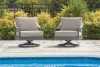 Ashley Furniture PCP510-821 Ocean Beach - Swivel Lounge With Cushion - Gray