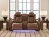 Ashley Furniture PCU1420018 Gruaro - Power Reclining Loveseat With Console / Adjustable Headrest - Amber