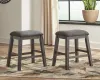Ashley Furniture D388-024 Caitbrook - Upholstered Stool (Set of 2) - Gray