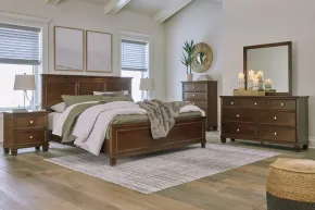 Ashley Furniture B685/31/36/46/56/58/94/92(2) Ashley Furniture B685/31/36/46/56/58/94/92(2) Danabrin - 8 Pc. - Dresser, Mirror, Chest, California King Panel Bed, 2 Nightstands - Brown