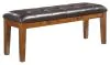 Ashley Furniture D594-00 Ralene - Large UPH Dining Room Bench - Medium Brown