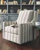 Ashley Furniture A3000207 Kambria - Swivel Glider Accent Chair - Ivory / Black