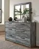 Ashley Furniture B221/31/35/46/58/56S/95/B100-14 Ashley Furniture B221/31/35/46/58/56S/95/B100-14 Baystorm - 7 Pc. - Dresser, Mirror, Chest, King Panel Bed with 2 Storage Drawers - Gray