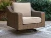 Ashley Furniture PCP790-821 Laguna Heights - Swivel Lounge With Cushion - Beige