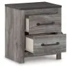 Ashley Furniture B1290-92 Bronyan - Two Drawer Night Stand - Dark Gray