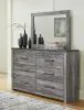 Ashley Furniture B1290/31/36/44/71/98/92(2) Ashley Furniture B1290/31/36/44/71/98/92(2) Bronyan - Queen Panel Bed - 7 Pc. - Dresser, Mirror, Chest, Queen Bed, 2 Nightstands - Dark Gray