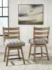 Benchcraft® D858-224 Ridgester - Upholstered Swivel Barstool (Set of 2) - Light Brown