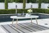 Ashley Furniture P798-625 Seton Creek - Oval Dining Table With Umb Opt - White
