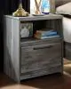 Ashley Furniture B221/31/35/46/58/56S/95/B100-14/91(2) Ashley Furniture B221/31/35/46/58/56S/95/B100-14/91(2) Baystorm - 9 Pc. - Dresser, Mirror, Chest, King Panel Bed with 2 Storage Drawers, 2 Nightstands - Gray