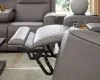 Ashley Furniture PCU1090018 5Z-Comfort - Power Reclining Loveseat With Console / Adj Headrest - Coin