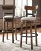 Ashley Furniture D546-430 Valebeck - Tall UPH Swivel Barstool - Brown