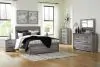 Ashley Furniture B1290/31/36/44/71/98/92(2) Ashley Furniture B1290/31/36/44/71/98/92(2) Bronyan - Queen Panel Bed - 7 Pc. - Dresser, Mirror, Chest, Queen Bed, 2 Nightstands - Dark Gray