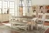 Ashley Furniture D647/25/01(2)/00(2)/60/76(3) Bolanburg - 9 Pc. - Dining Room Table, 2 Side Chairs, Bench (2), Server, 3 Cabinets - Beige