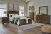 Ashley Furniture B685/31/36/57/54/97/92(2) Ashley Furniture B685/31/36/57/54/97/92(2) Danabrin - 7 Pc. - Dresser, Mirror, Queen Panel Bed, 2 Nightstands - Brown