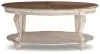 Ashley Furniture T743-0 Realyn - Oval Cocktail Table - White / Brown