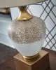Ashley Furniture L430894 Tavisburg - Glass Table Lamp - Brown / White / Gold