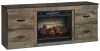 Ashley Furniture EW0446W8 Trinell - TV Stand With Electric Fireplace - Brown