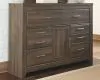 Ashley Furniture B251/31/36/46/57 Juararo - 4 Pc. - Dresser, Mirror, Chest, Queen Panel Headboard - Dark Brown